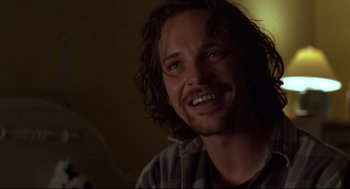 Movie still from “Boys Don't Cry” (1999), directed by Kimberly Peirce – A person with long dark hair; Close Up shot, Low angle