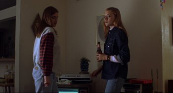 Movie still from “Boys Don't Cry” (1999), directed by Kimberly Peirce – Two young women standing next to each other; Medium shot, Low angle