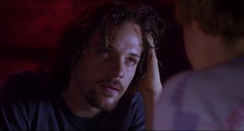 Movie still from “Boys Don't Cry” (1999), directed by Kimberly Peirce – A person with long hair; Close Up shot, Over the shoulder angle