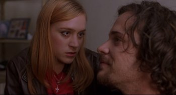 Movie still from “Boys Don't Cry” (1999), directed by Kimberly Peirce – A woman and a man staring at each other; Close Up shot, Over the shoulder angle