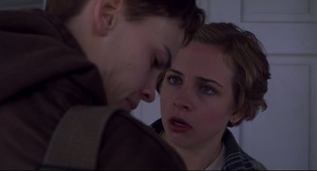 Movie still from “Boys Don't Cry” (1999), directed by Kimberly Peirce – A young man and a young woman looking at one another; Close Up shot, Over the shoulder angle