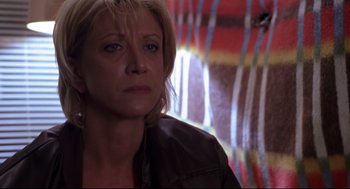 Movie still from “Boys Don't Cry” (1999), directed by Kimberly Peirce – A person wearing a jacket; Close Up shot, Low angle