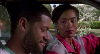 Movie still from “Boyz n the Hood” (1991), directed by John Singleton – A man and a woman sitting in the back of a car; Close Up shot, Over the shoulder angle
