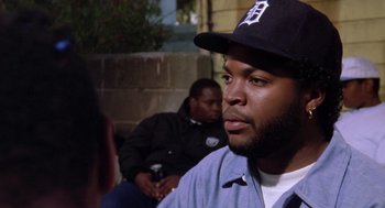 Movie still from “Boyz n the Hood” (1991), directed by John Singleton – A person wearing a hat; Close Up shot, Over the shoulder angle