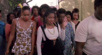 Movie still from “Boyz n the Hood” (1991), directed by John Singleton – A group of women standing next to each other in a line; Medium shot, High angle