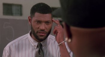 Movie still from “Boyz n the Hood” (1991), directed by John Singleton – A man looking at himself in the mirror; Close Up shot, High angle