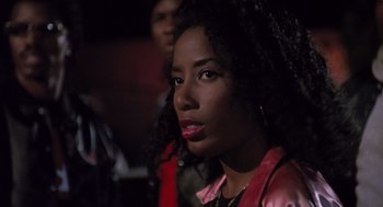 Movie still from “Boyz n the Hood” (1991), directed by John Singleton – A person wearing a jacket; Close Up shot, Over the shoulder angle