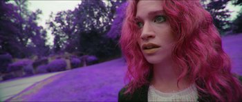 A person with pink hair