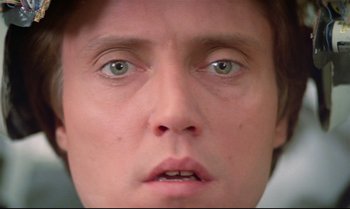 Movie still from “Brainstorm” (1983), directed by Douglas Trumbull – A person's face with green eyes; Extreme Close Up shot, Low angle