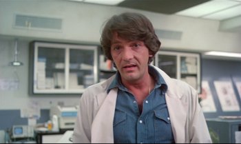 Movie still from “Brainstorm” (1983), directed by Douglas Trumbull – A person wearing a lab coat; Close Up shot, Low angle