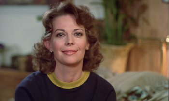 Movie still from “Brainstorm” (1983), directed by Douglas Trumbull – A person with curly hair; Close Up shot, Over the shoulder angle