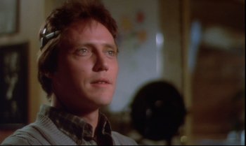 Movie still from “Brainstorm” (1983), directed by Douglas Trumbull – A person wearing a sweater; Close Up shot, Low angle