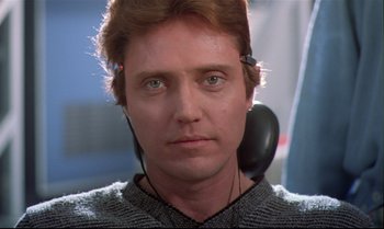 Movie still from “Brainstorm” (1983), directed by Douglas Trumbull – A person wearing headphones; Close Up shot, Over the shoulder angle
