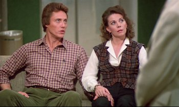 Movie still from “Brainstorm” (1983), directed by Douglas Trumbull – A man and a woman sitting next to each other; Medium shot, Over the shoulder angle
