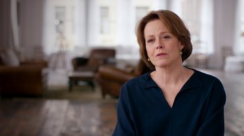 Movie still from “The Beatles: Eight Days a Week - The Touring Years” (2016), directed by Ron Howard – A person wearing a blue shirt; Close Up shot, Over the shoulder angle