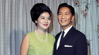 Movie still from “The Beatles: Eight Days a Week - The Touring Years” (2016), directed by Ron Howard – An older man and woman posing for a picture; Close Up shot, Low angle