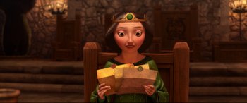 Movie still from “Brave” (2012), directed by Steve Purcell – A woman in a green dress holding a pair of yellow envelopes in her hands; Close Up shot, Over the shoulder angle