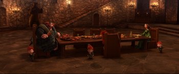 Movie still from “Brave” (2012), directed by Steve Purcell – An image of gnomes sitting at a table with food on it; Wide shot, High angle