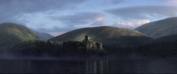 Movie still from “Brave” (2012), directed by Steve Purcell – A castle on top of a hill next to a body of water; Extreme Wide shot, Low angle