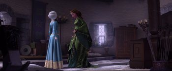 Movie still from “Brave” (2012), directed by Steve Purcell – Two women dressed in medieval clothing standing in front of a window; Wide shot, Over the shoulder angle