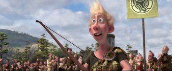 Movie still from “Brave” (2012), directed by Steve Purcell – A man with blonde hair is holding a bow and arrow; Medium shot, Low angle
