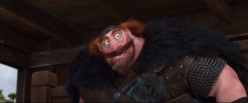 Movie still from “Brave” (2012), directed by Steve Purcell – An image of an animated character with a big beard; Medium shot, Low angle