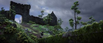 Movie still from “Brave” (2012), directed by Steve Purcell – A man walking on a path near a castle; Extreme Wide shot, Low angle