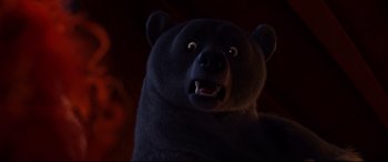 Movie still from “Brave” (2012), directed by Steve Purcell – A black bear with its mouth wide open; Close Up shot, Low angle