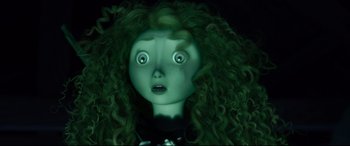 Movie still from “Brave” (2012), directed by Steve Purcell – A creepy doll with green curly hair and a black shirt; Close Up shot, Low angle