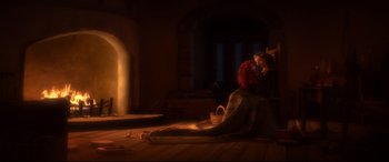 Movie still from “Brave” (2012), directed by Steve Purcell – A woman sitting on the floor in a room; Wide shot, Over the shoulder angle
