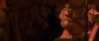 Movie still from “Brave” (2012), directed by Steve Purcell – A character's face with a bear in the background; Close Up shot, Over the shoulder angle