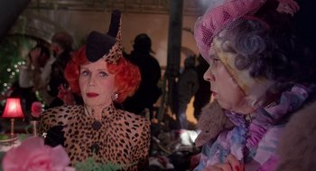 Movie still from “Brazil” (1985), directed by Terry Gilliam – Two women dressed up in costumes for a halloween party; Close Up shot, Over the shoulder angle