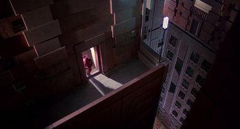 Movie still from “Brazil” (1985), directed by Terry Gilliam – A view from above looking down on a building; Extreme Wide shot, Overhead angle