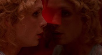 Movie still from “Breakfast on Pluto” (2005), directed by Neil Jordan – A man and a woman face to face in the dark; Close Up shot, Overhead angle