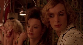Movie still from “Breakfast on Pluto” (2005), directed by Neil Jordan – Two women sitting next to each other in a room; Close Up shot, Over the shoulder angle