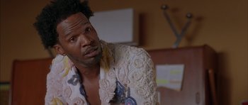 Movie still from “Breakin' All the Rules” (2004), directed by Daniel Taplitz – A person wearing a jacket; Close Up shot, Low angle