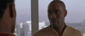 Movie still from “Breakin' All the Rules” (2004), directed by Daniel Taplitz – A person wearing a sweater; Close Up shot, Over the shoulder angle