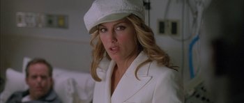 Movie still from “Breakin' All the Rules” (2004), directed by Daniel Taplitz – A person wearing a hat; Close Up shot, Low angle