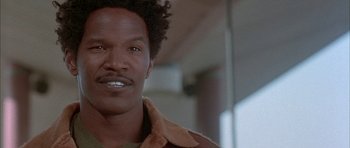 Movie still from “Breakin' All the Rules” (2004), directed by Daniel Taplitz – A person with a beard; Close Up shot, Low angle