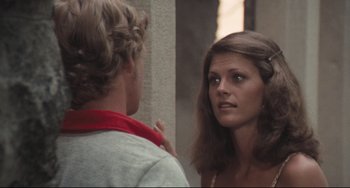 Movie still from “Breaking Away” (1979), directed by Peter Yates – A man and a woman looking at each other in a mirror; Close Up shot, Over the shoulder angle