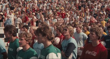 Movie still from “Breaking Away” (1979), directed by Peter Yates – A large crowd of people are gathered together; Close Up shot, High angle