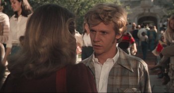 Movie still from “Breaking Away” (1979), directed by Peter Yates – A man and a woman talking to each other; Medium shot, Over the shoulder angle
