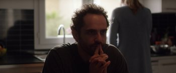 Movie still from “Breathe” (2014), directed by Mélanie Laurent – A person with his finger in his mouth; Close Up shot, Over the shoulder angle