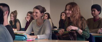 Movie still from “Breathe” (2014), directed by Mélanie Laurent – A group of young women sitting at a table; Medium shot, Over the shoulder angle