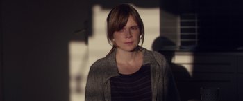 Movie still from “Breathe” (2014), directed by Mélanie Laurent – A young woman is looking at the camera; Close Up shot, Over the shoulder angle