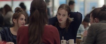 Movie still from “Breathe” (2014), directed by Mélanie Laurent – A woman sitting in front of another woman at a table; Close Up shot, Over the shoulder angle