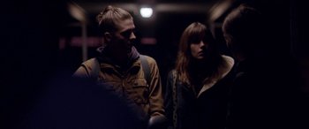 Movie still from “Breathe” (2014), directed by Mélanie Laurent – A man and a woman standing next to each other; Close Up shot, Over the shoulder angle