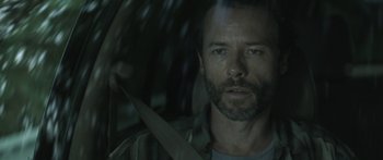 Movie still from “Breathe In” (2013), directed by Drake Doremus – A person with a beard; Close Up shot, Over the shoulder angle