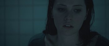 Movie still from “Breathe In” (2013), directed by Drake Doremus – A person looking at the camera; Close Up shot, Overhead angle