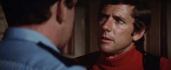 Movie still from “Brewster McCloud” (1970), directed by Robert Altman – A person looking at a mirror; Close Up shot, Over the shoulder angle